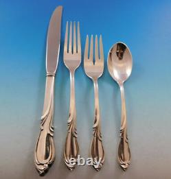 Rhapsody New by International Sterling Silver Regular Size Place Setting(s) 4pc