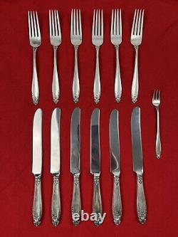 13 couverts en argent International Sterling Prelude : 7 fourchettes et 6 couteaux.