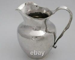 International Sterling Silver Hammered Water Pitcher Thistle Repousse C1900